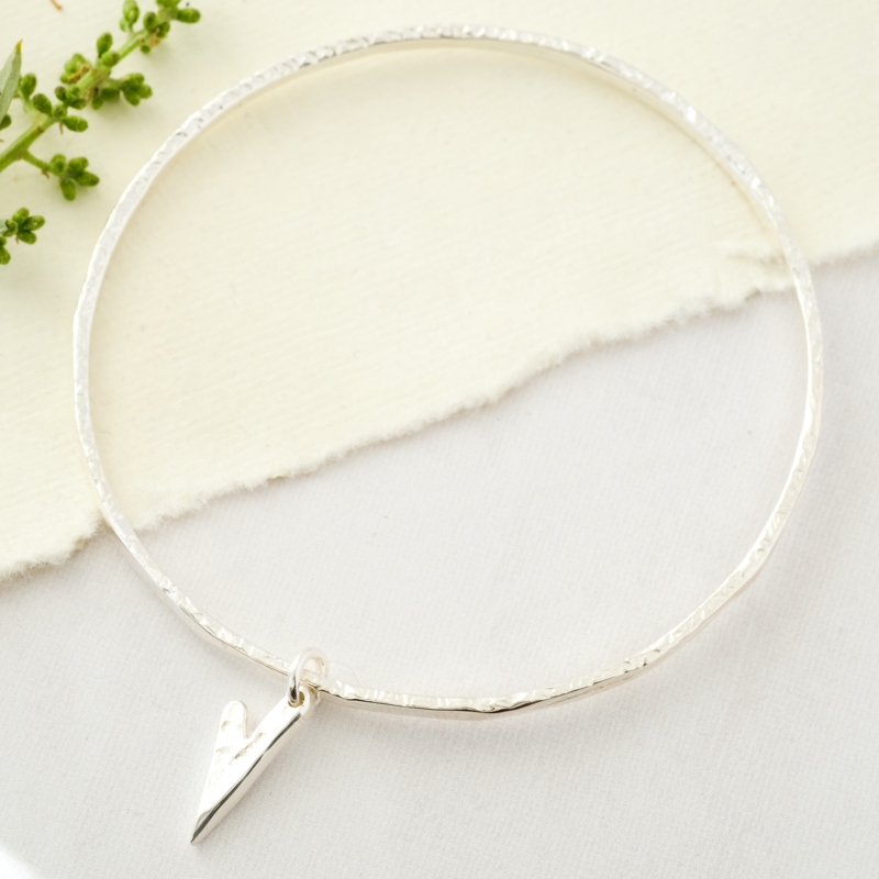 heart charm on silver bangle