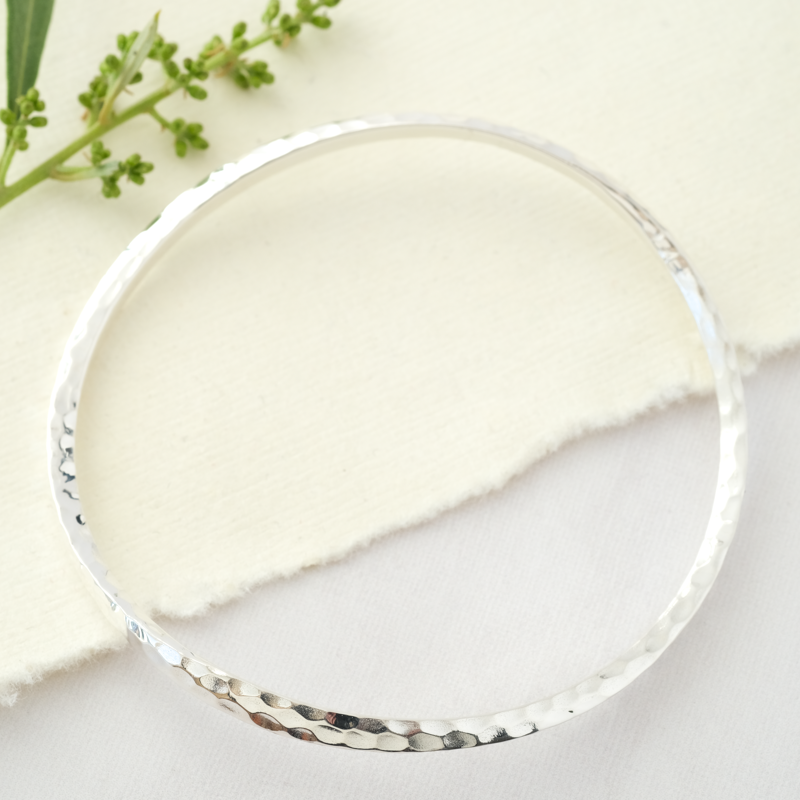 silver bangles and silver bracelets