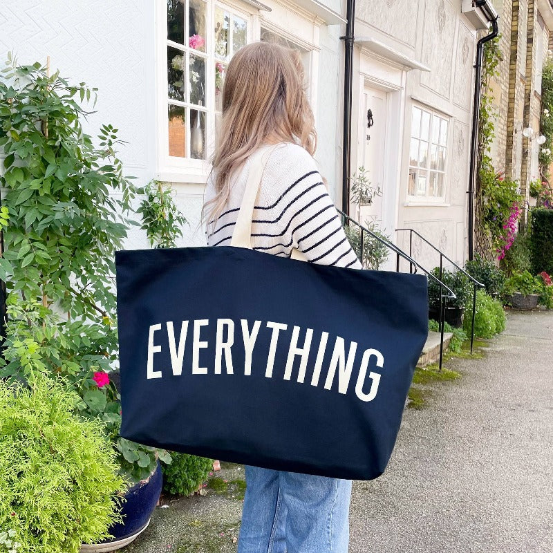 the extra large 'everything'tote bag in dark blue and white lettering