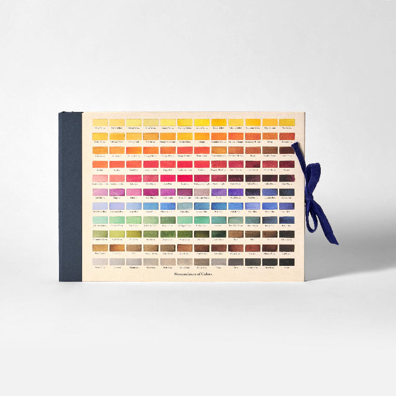 Color swatch book with a blue ribbon on a white background