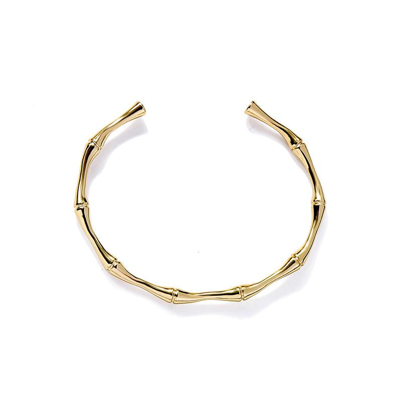 Gold headband with white hair on a white background