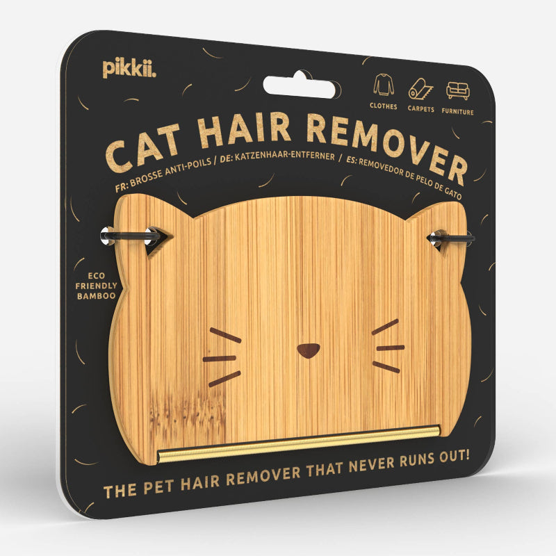 Packaging of a cat-shaped bamboo pet hair remover with the product visible through a cut-out window. The package is labeled 'Cat Hair Remover' and highlights its eco-friendly bamboo material.