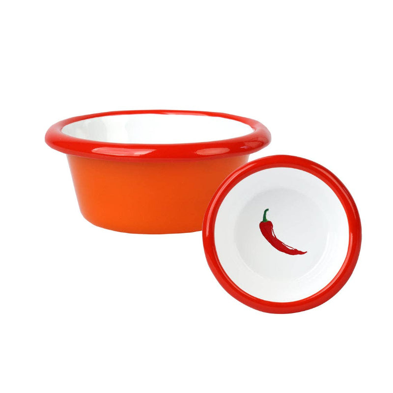Orange bowl with red rim and white lid featuring a chili pepper design on a white background