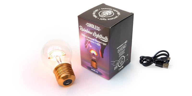 Coiled light bulb with packaging and USB cable on a white background