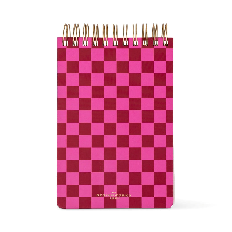 checked red and pink covered notepad
