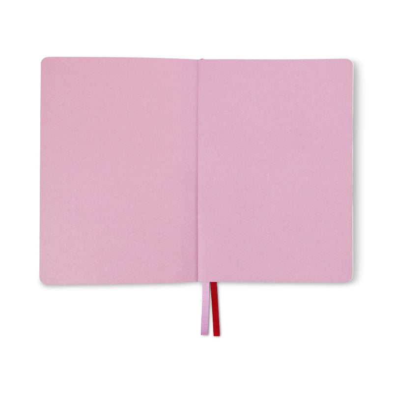 Pink notebook with a red ribbon on a white background