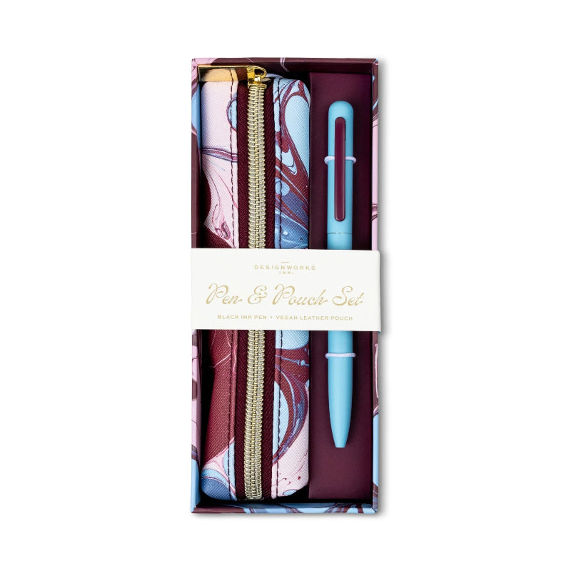 Pen and pouch set in a decorative box on a white background with a sky burgundy ink marble pattern