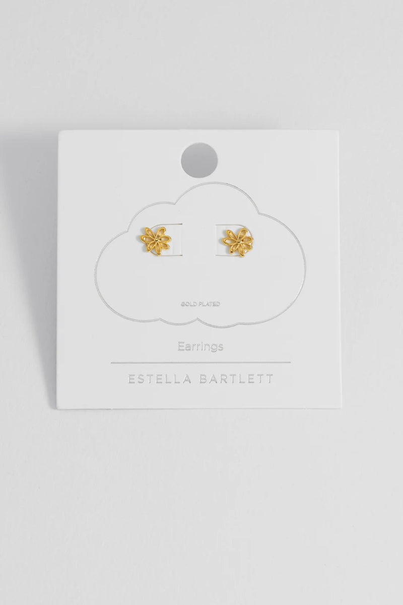 Gold earrings on a branded card with 'Estella Bartlett' on a white background