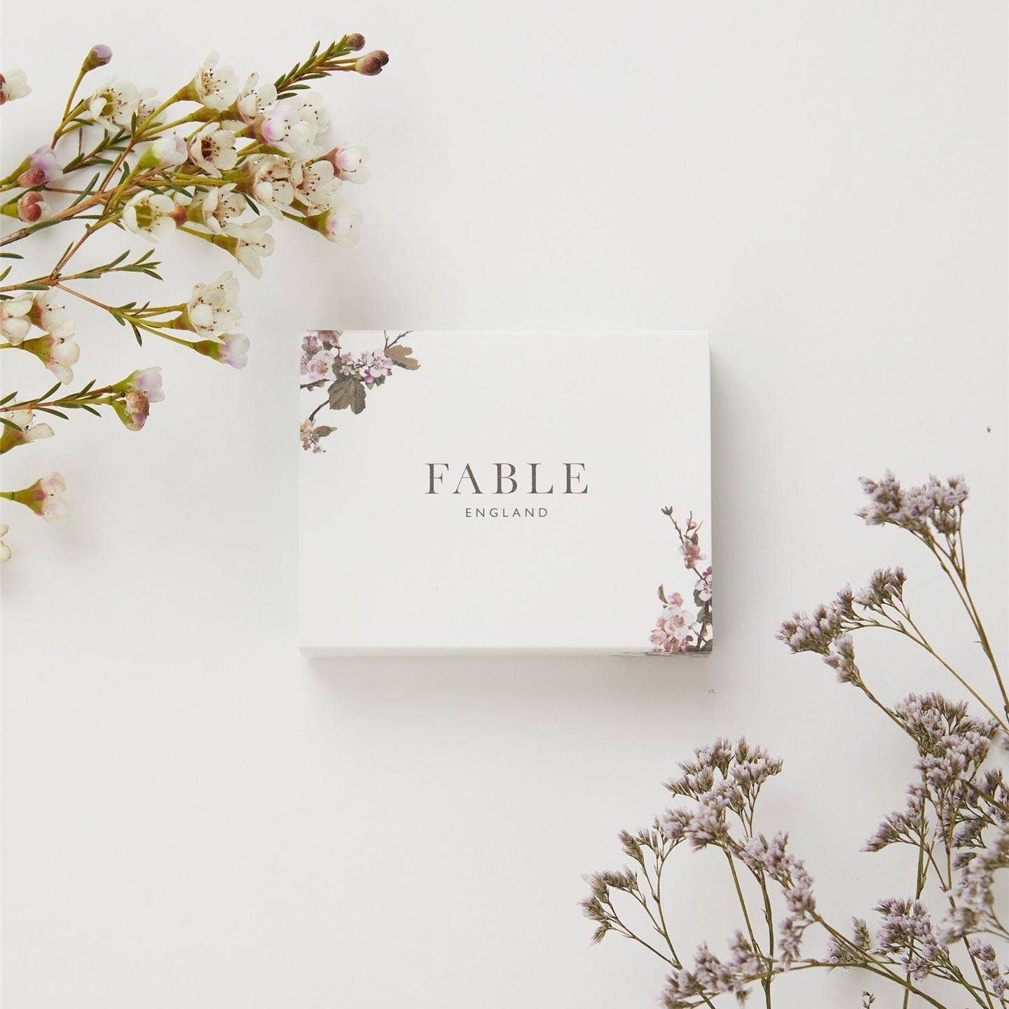 Fable England box with floral elements on a light background