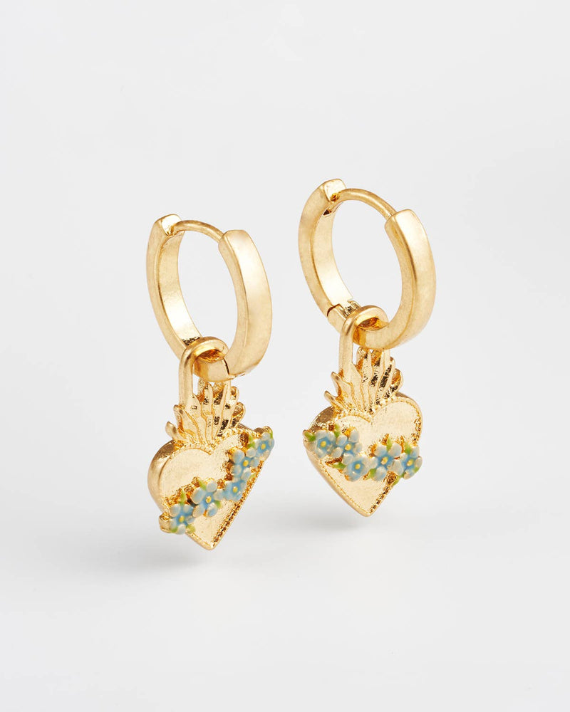 Fable Sacred Heart Huggie Earrings Gold  with floral details on a light grey background