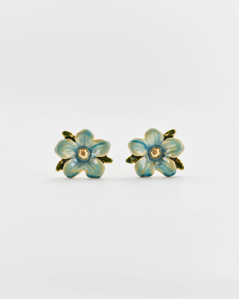 Pair of flower-shaped earrings with gold accents on a white background