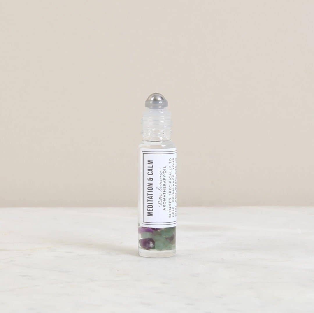 Small bottle labeled 'Nudation & Calm' on a light background, Gemstone Pulse Point Oil - Meditation & Calm 10ml