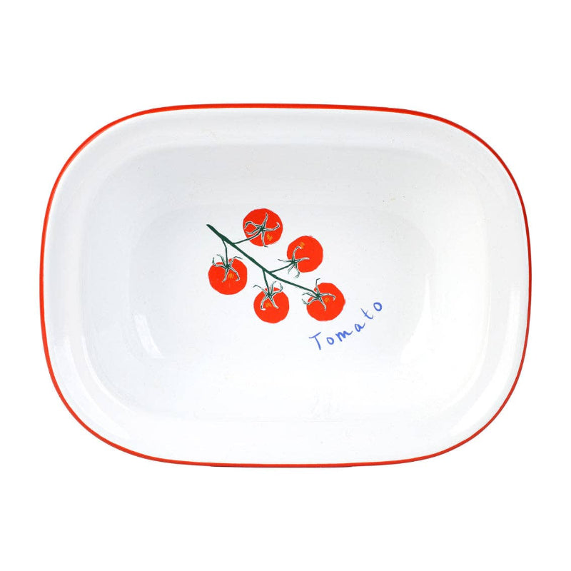 White dish with red rim and tomato design on a white background