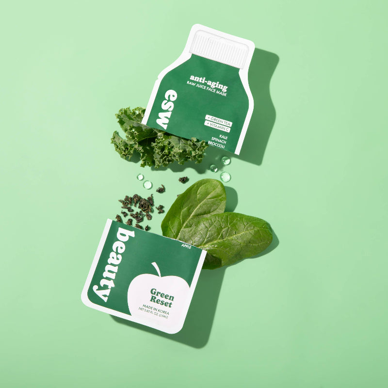 Two green packets labeled 'Beauty' and 'Eslava' with leaves and pills on a light green background
