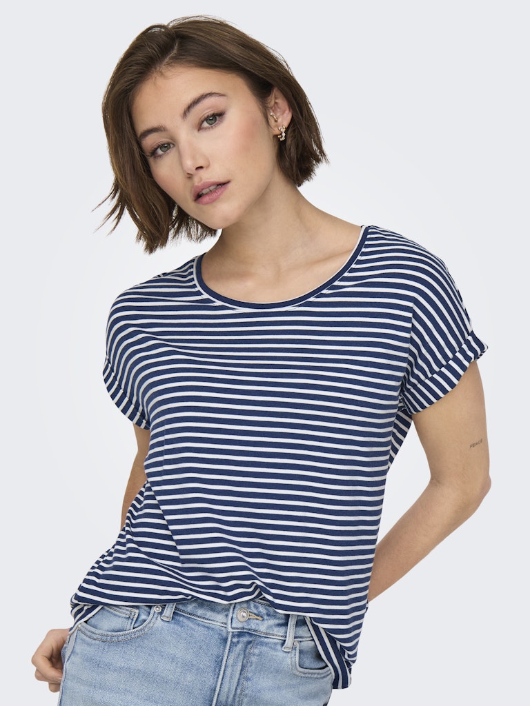 Woman wearing a blue and white striped shirt against a plain background