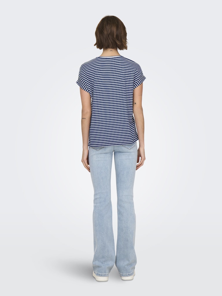 Person wearing a striped shirt and light blue jeans on a white background