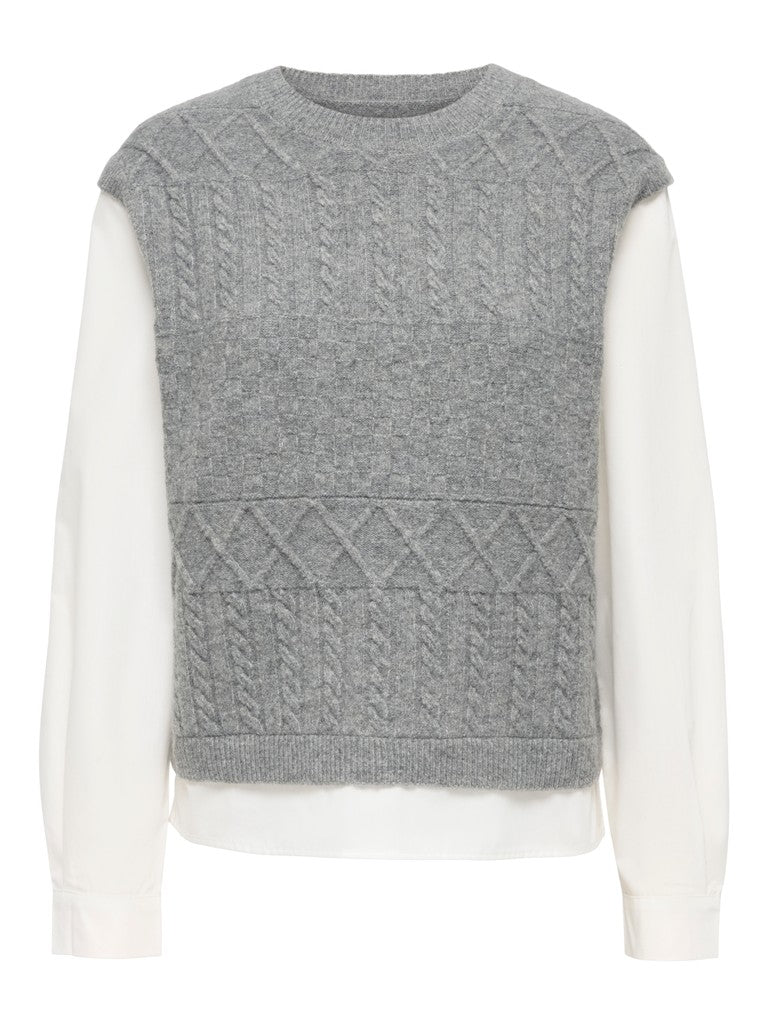A gray cable-knit sweater vest layered over a white long-sleeve crewneck shirt, shown against a plain white background.