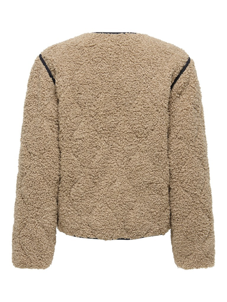 A beige sherpa fleece cropped jacket with black contrast piping along the shoulders, shown from the back on a white background.