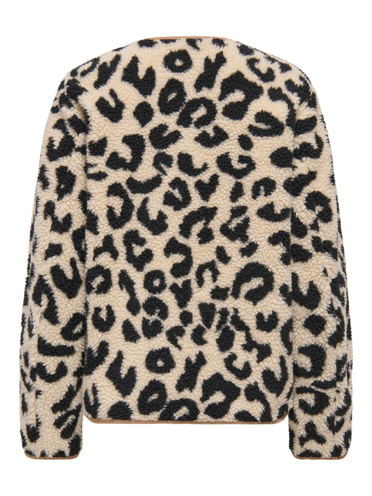 A cropped sherpa fleece jacket with a black leopard print pattern on a warm beige background, shown from the back against a plain white background.