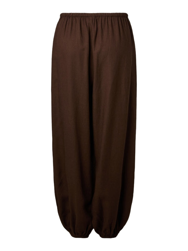 Brown baggy pants on a white background