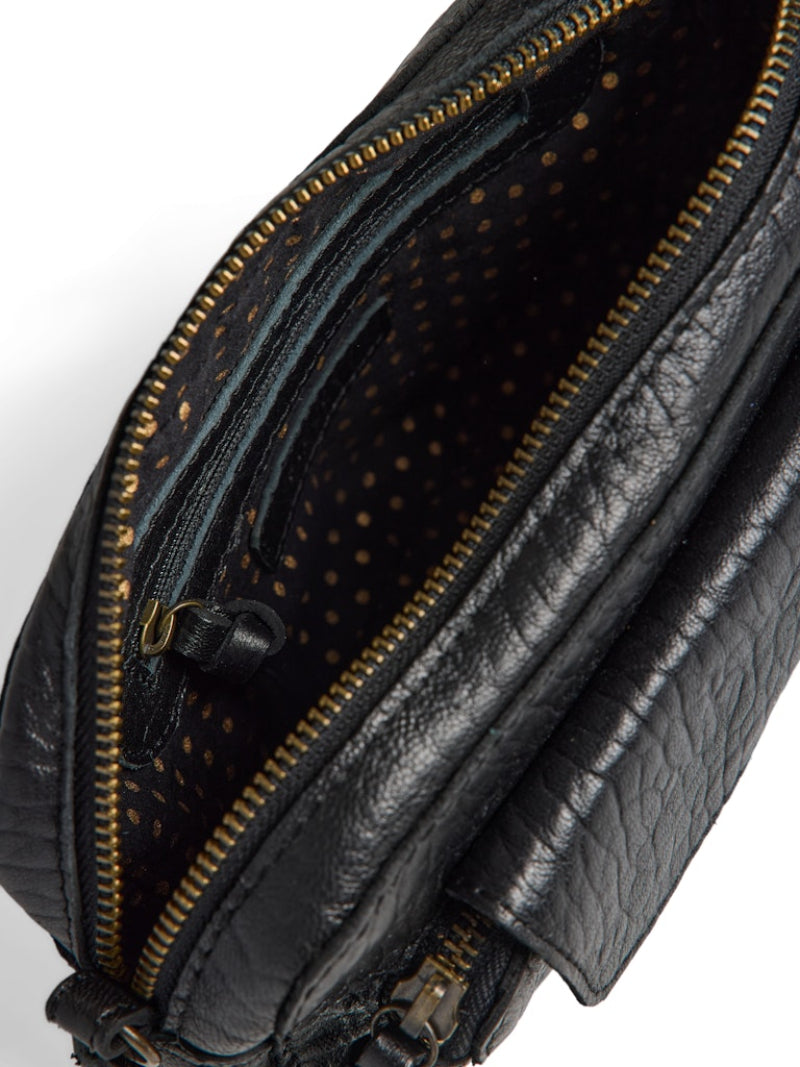 Black leather bag with gold zipper on a white background