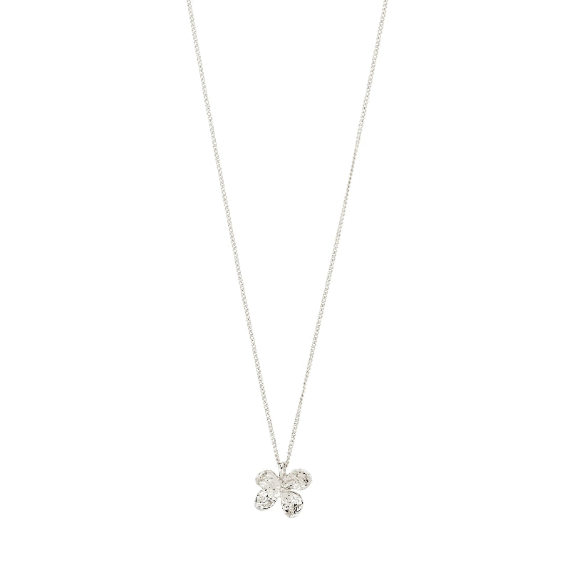 Silver necklace with a flower pendant on a white background