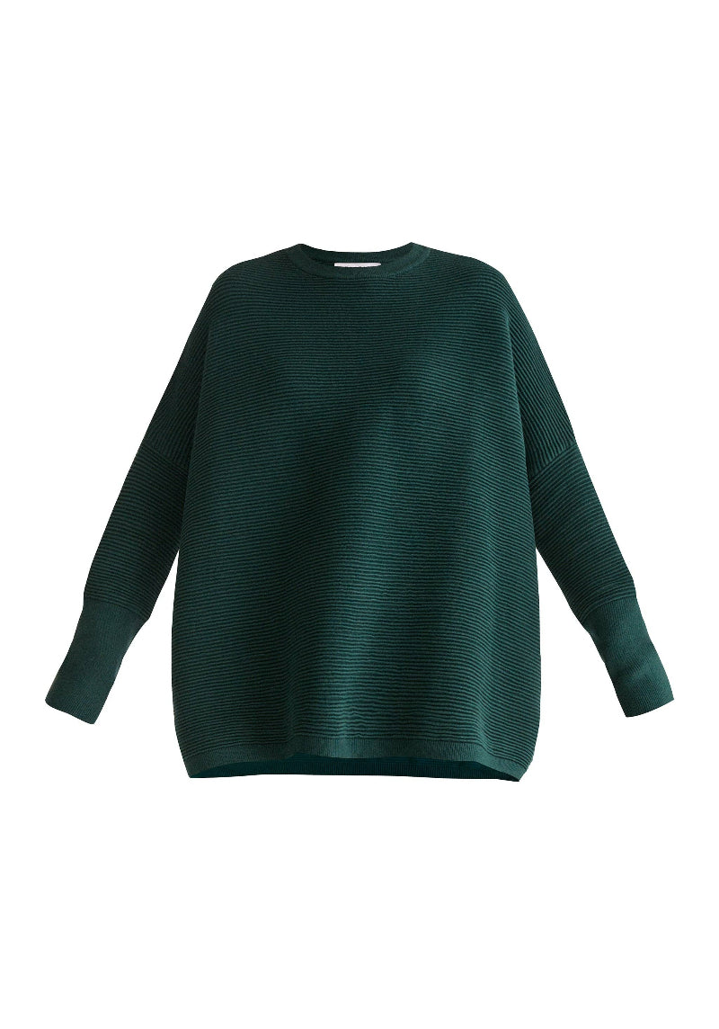 Green sweater on a white background