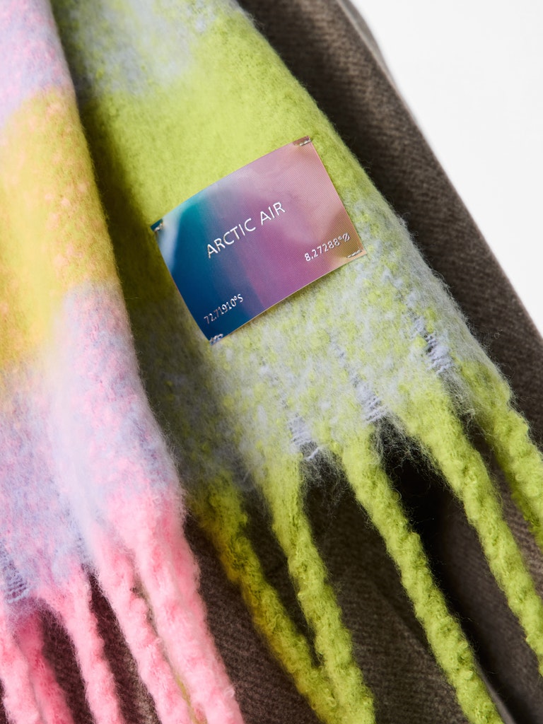 Multicolored fabric with a 'Arctic Air' label on a white background