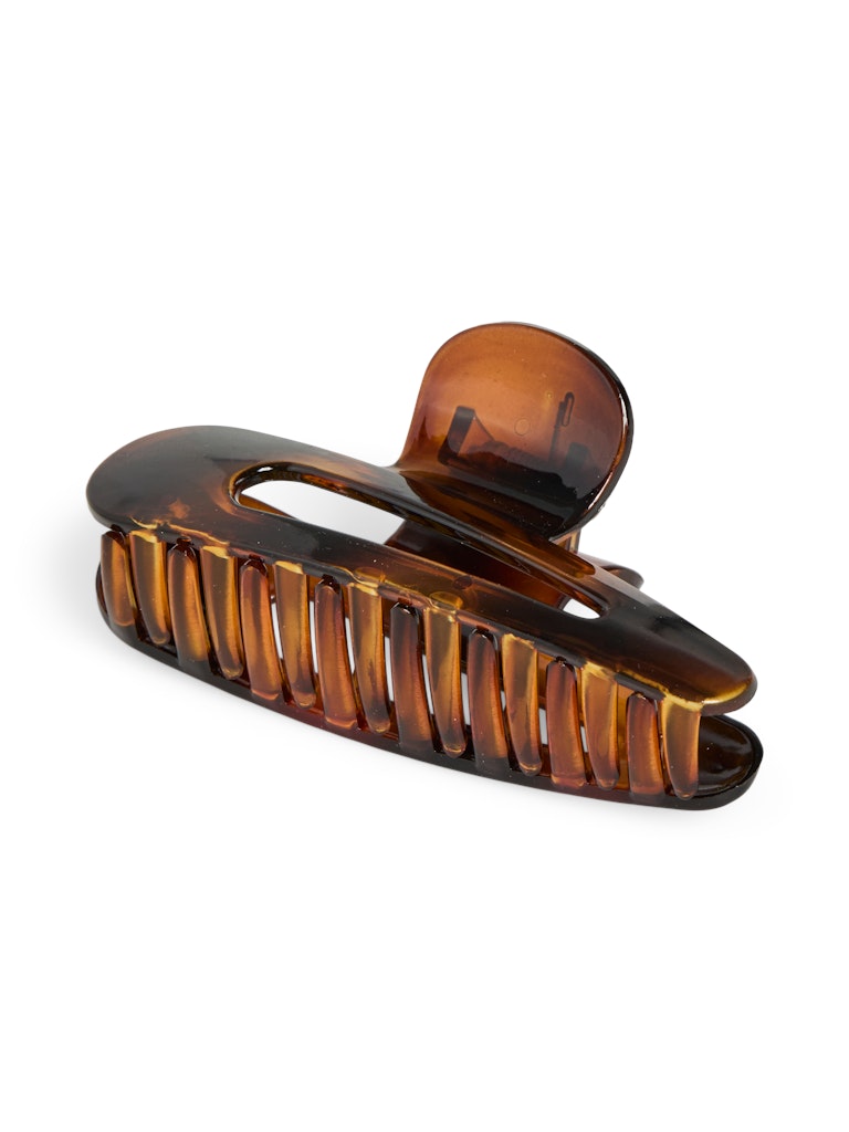 Brown hair clip on a white background