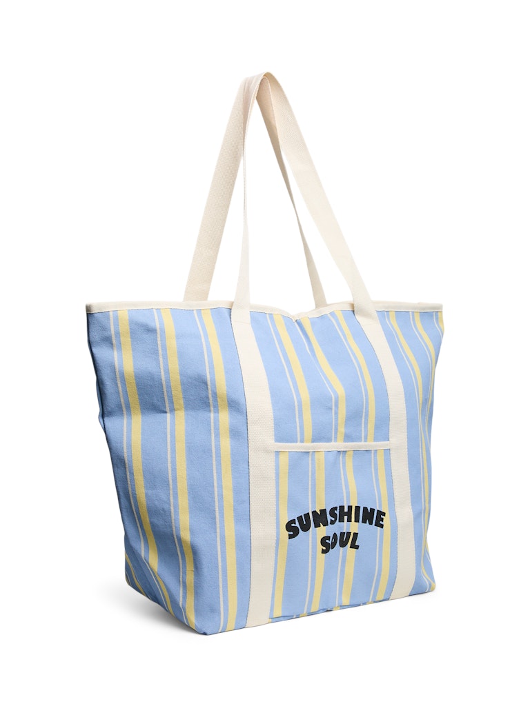 Striped tote bag with 'Sunshine Soul' text on a white background