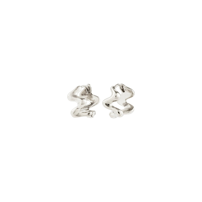 silver wavy earrings on white background