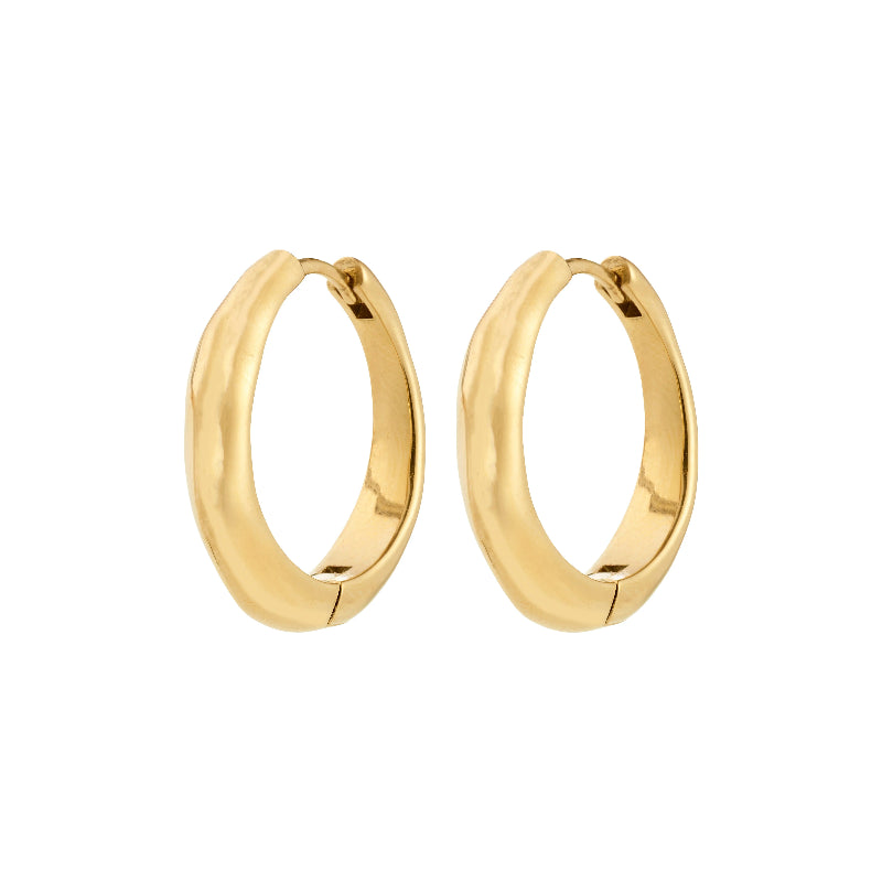 Gold hoop earrings on a white background