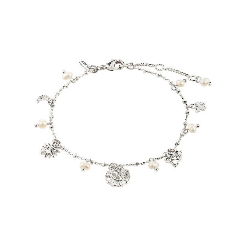 Silver bracelet with charms and pearls on a white background