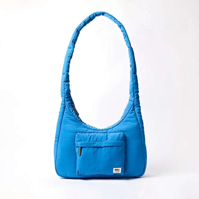 Roka Belize  Blue handbag with a pocket on a white background
