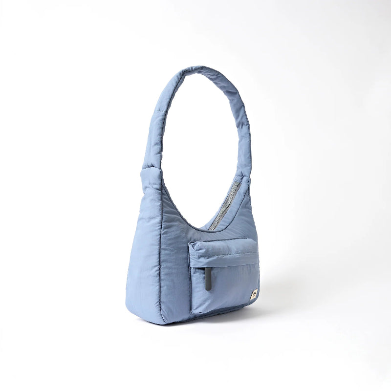 Roka Belize Handbag Retro Blue with a pocket on a white background