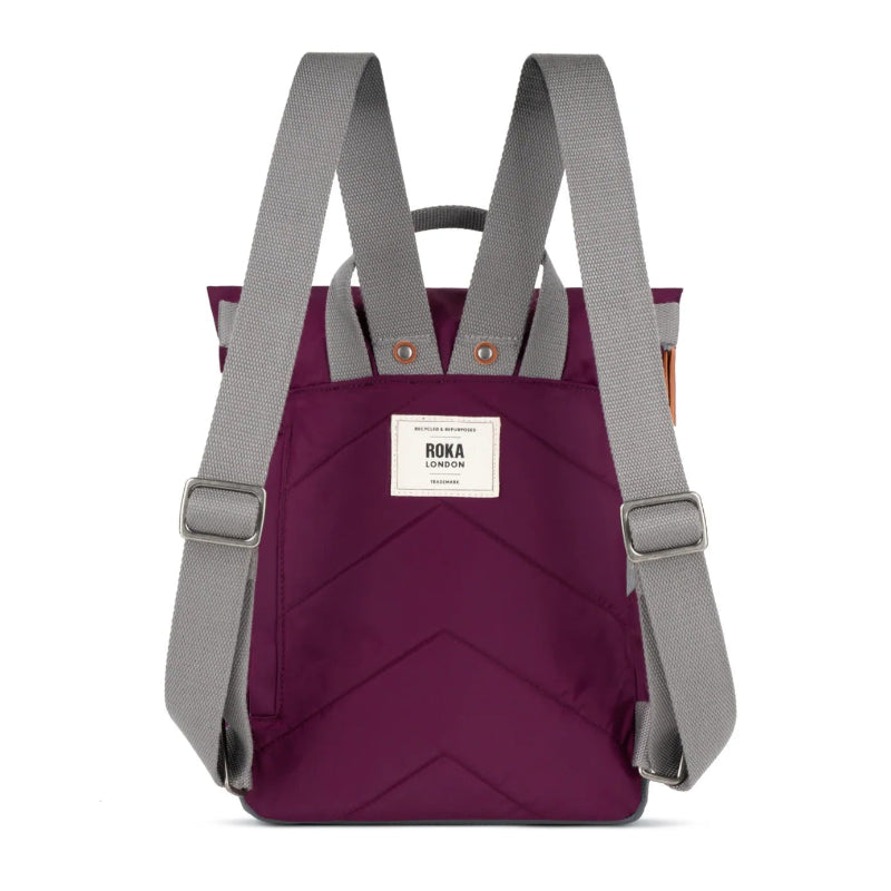 Roka Canfield royal burgundy backpack with gray straps on a white background