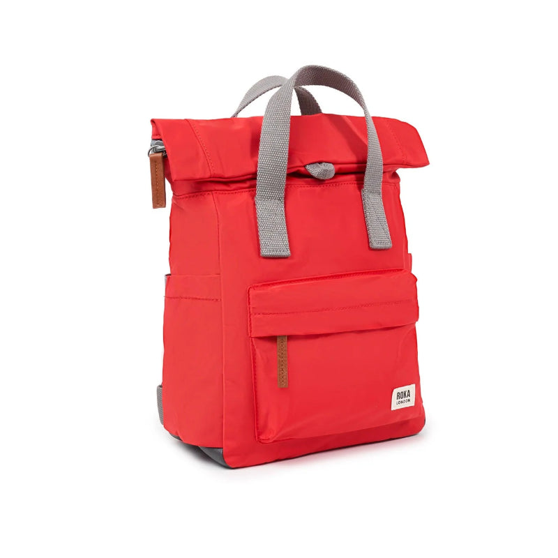 Red backpack with gray straps on a white background
