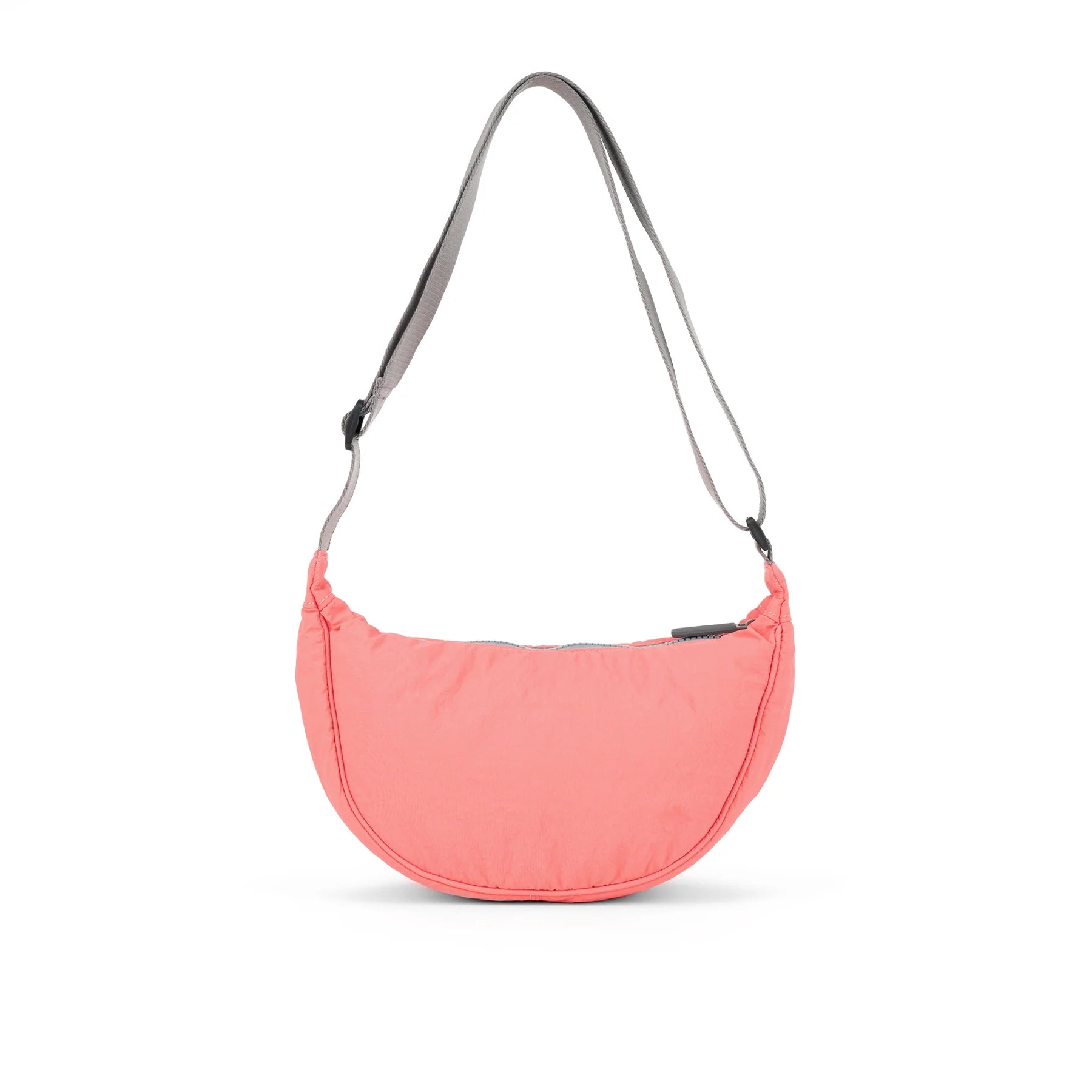 Roka Farringdon sling bag in coral back view