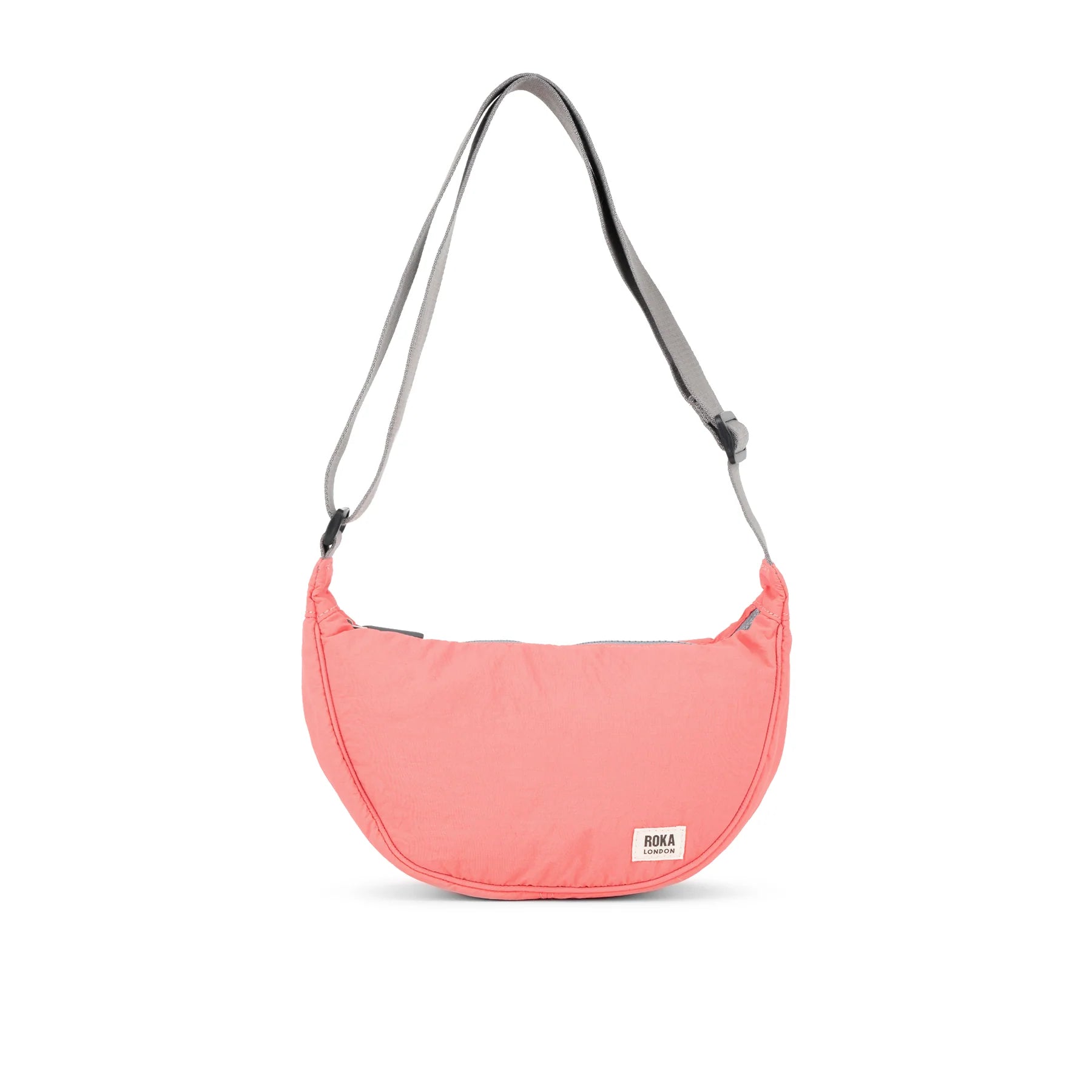 Roka Farringdon sling bag in coral