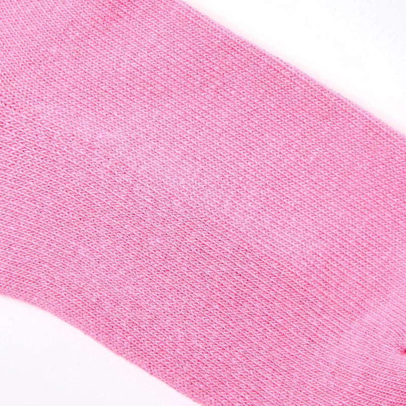 Close-up of a pink sock with a white background