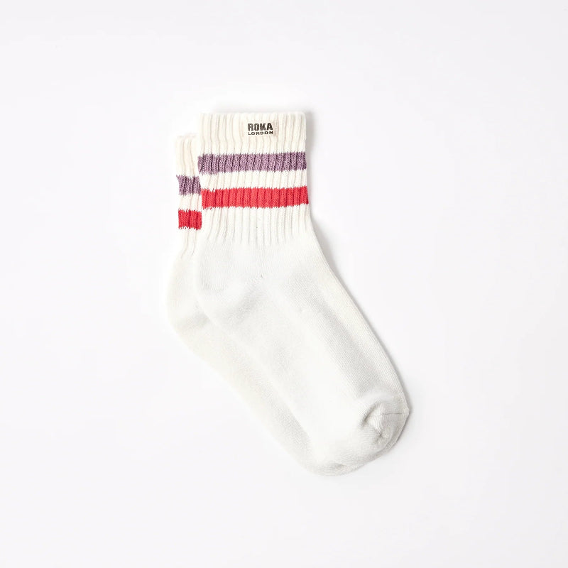 White sock with red and purple stripes on a white background