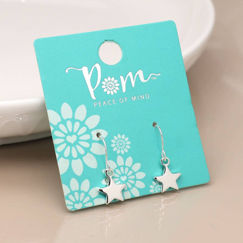 Star-shaped earrings on a 'Peace of Mind' branded card with floral design.