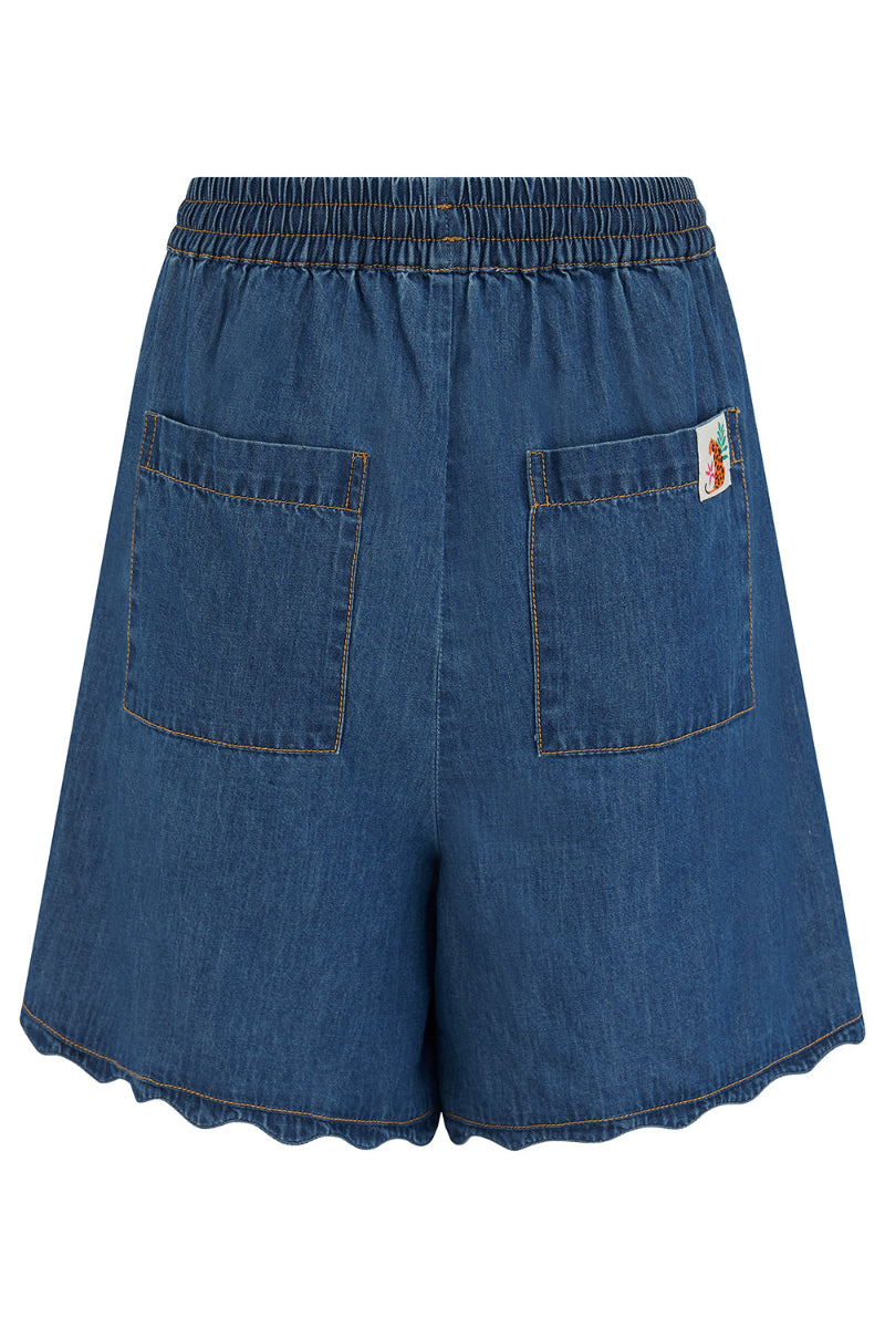 Blue denim shorts with a brand logo on a white background