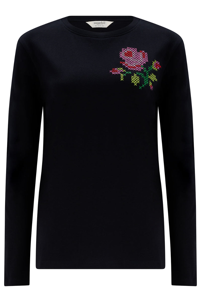 Black long-sleeve shirt with a floral pattern on a white background
