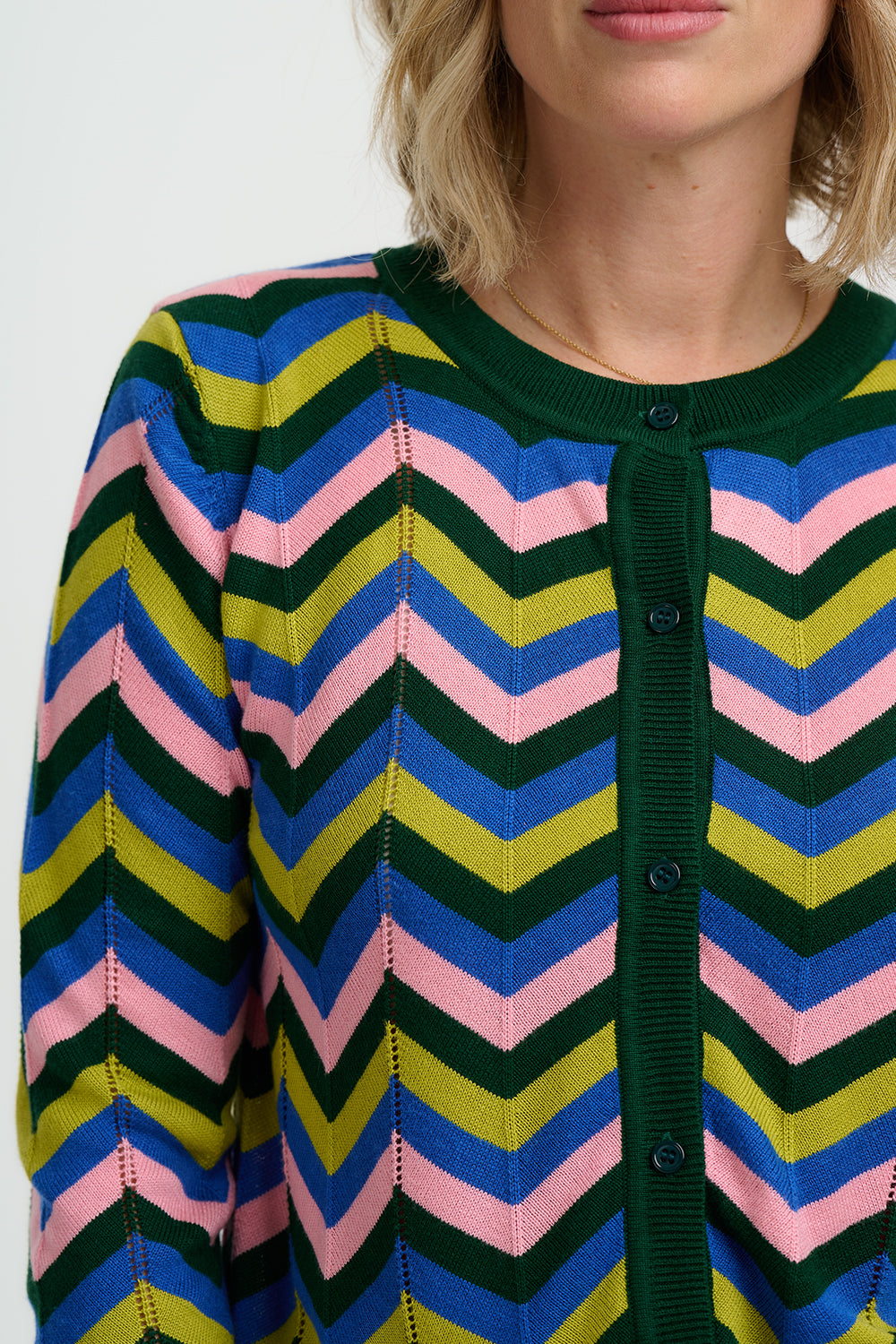 Multicolored striped Sugarhill Rochelle Cardigan with a close-up of the pattern on a plain background