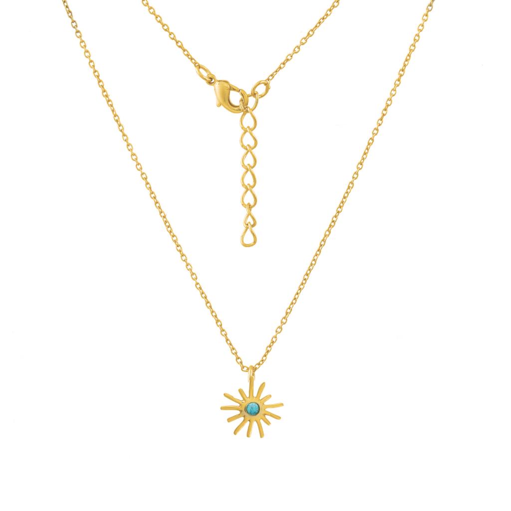 Gold necklace with a sun-shaped pendant on a white background