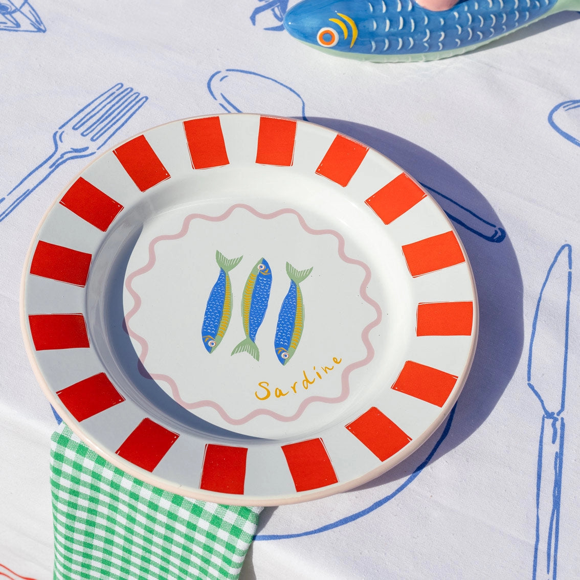Talking TAbles Sardine enamel dinner plate on white table cloth