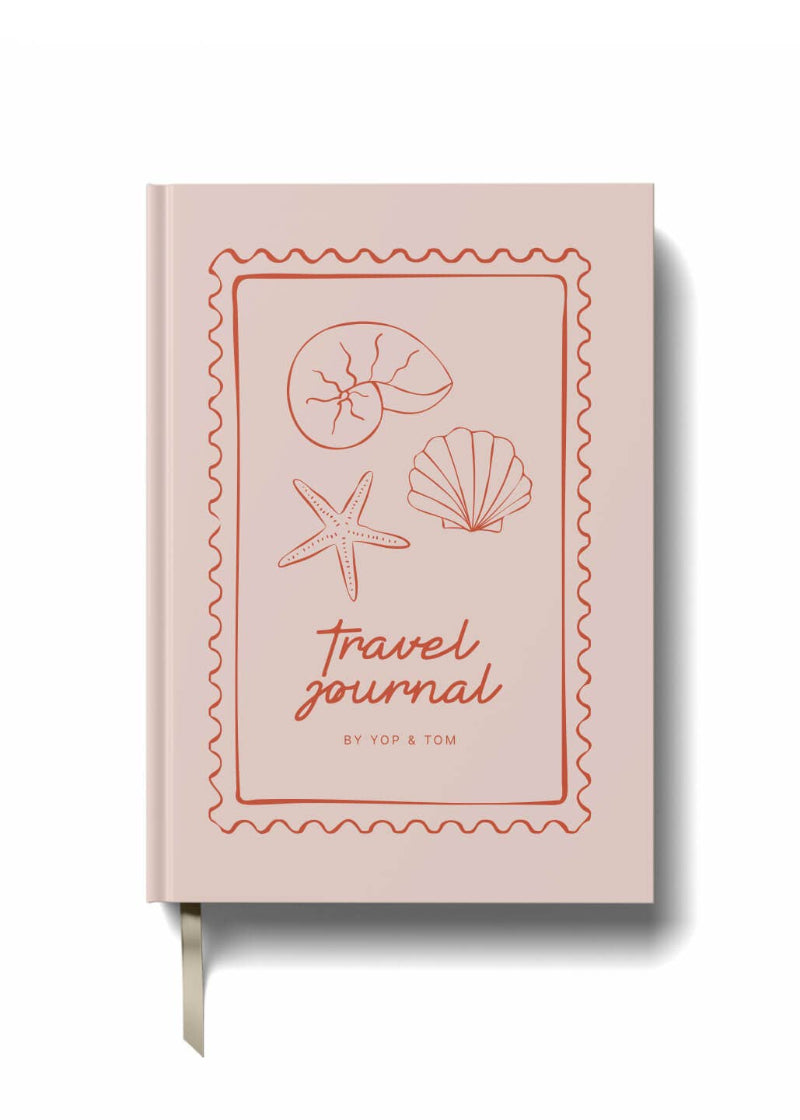 Pink travel journal with shell illustrations and 'Yom & Tom' branding on a white background