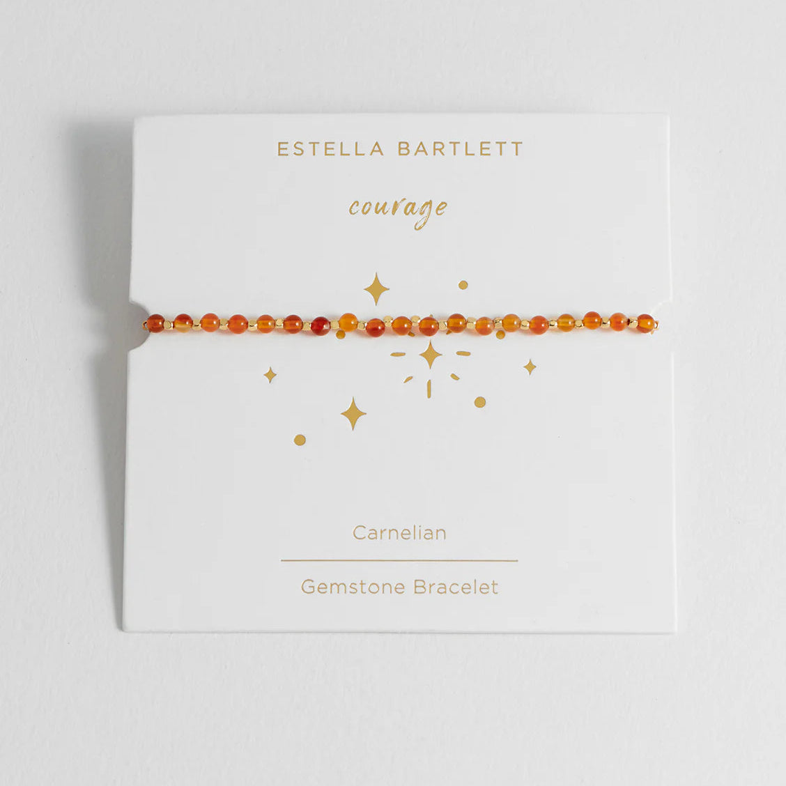 Estella Bartlett gemstone bracelet packaging on a light gray background