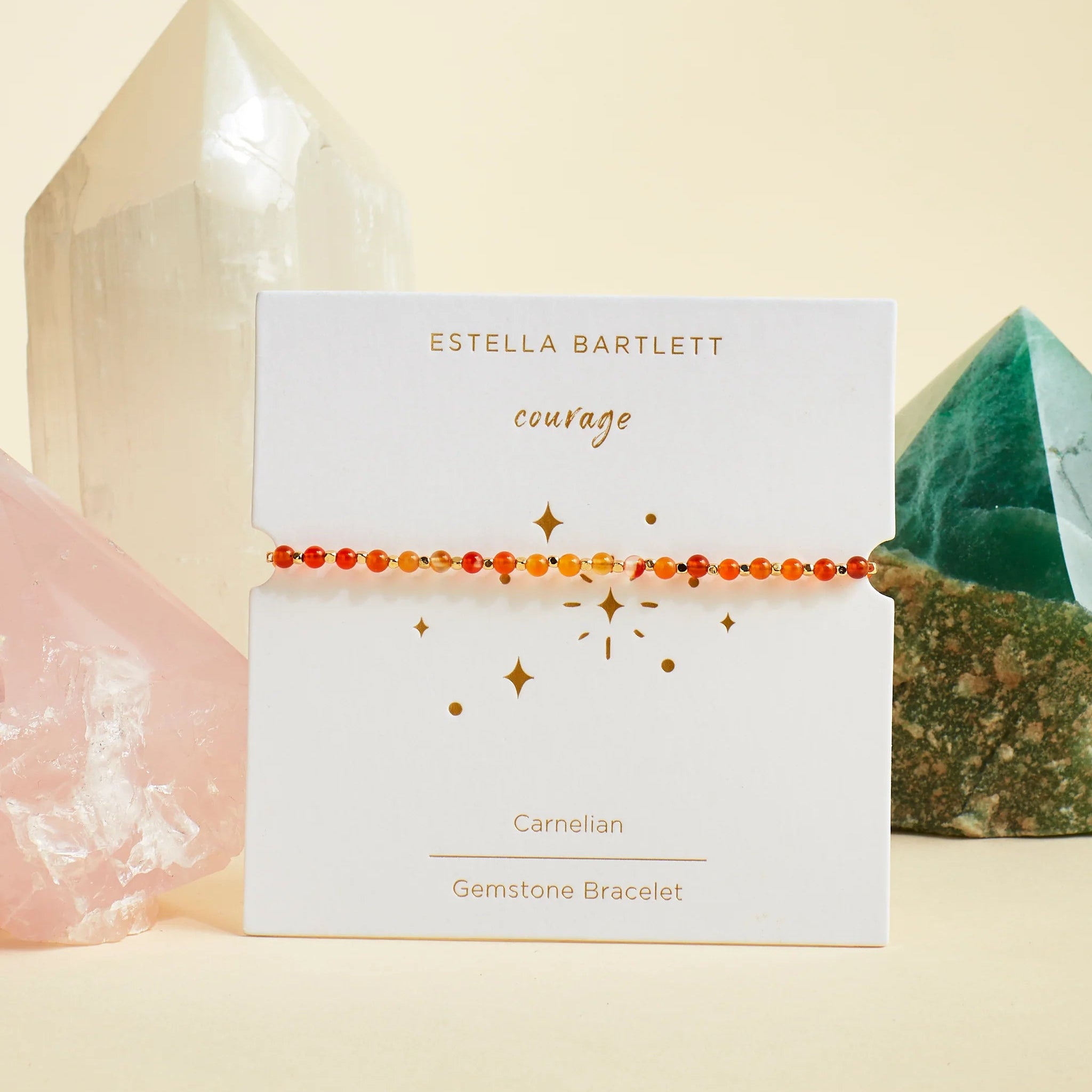 Estella Bartlett bracelet on a branded card with crystals in the background